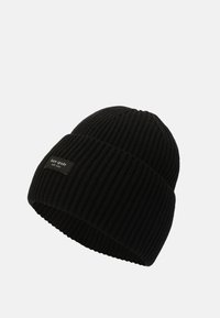 Gorro de punto negro con canalé, con un dobladillo y una etiqueta de tela rectangular que presenta "kate spade" en letras blancas.