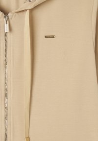 Freddy CON CAPPUCCIO ANIMALIER E ZIP FRONTALE - Sudadera con cremallera - irish cream zebra animalier