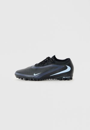 Black soccer shoe with textured synthetic upper, blue accents, lace closure, flat sole, and cleats designed for optimal traction.