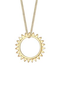 Guld vedhængs halskæde har et cirkulært design med solstråle-akcenter. Det hænger fra en snoet kæde og viser en poleret overflade.