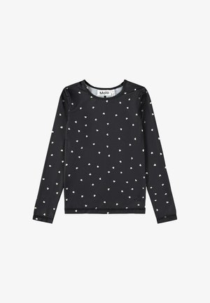 Zwarte shirt met lange mouwen, voorzien van een klein wit hartenpatroon, een ronde halslijn en subtiele branding in de onderste hoek. Gladde, rekbare stof.