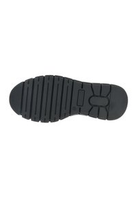 Suola di scarpa in gomma nera con scanalature orizzontali e verticali per una migliore aderenza, punta arrotondata e tacco leggermente rialzato.