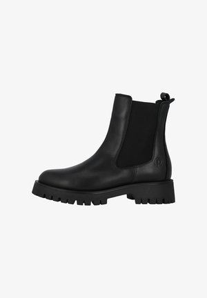 Black leather Chelsea boot with elastic side panels, rounded toe, and a rugged rubber sole featuring tread for traction.