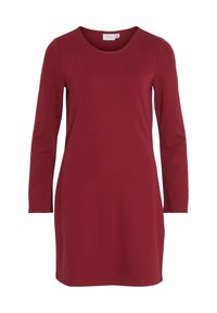 Vestido de manga larga en burdeos, confeccionado en tejido suave, con escote redondo y un corte recto que cae por encima de la rodilla.