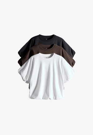 Three plain crew neck t-shirts layered, colors from front to back: white, dark brown, and black, displayed on a white background.