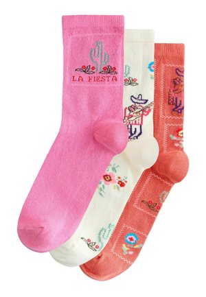 Set of three socks: pink with cactus graphics, white with floral pattern, and coral with decorative accents. All feature a soft, knit texture.