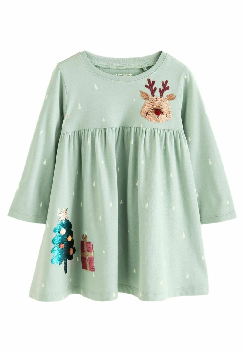 Ljusgrön långärmad klänning för småbarn med små vita trätryck, paljettälgansikte på bröstet, julgranar och presentdekorationer på kjolen.