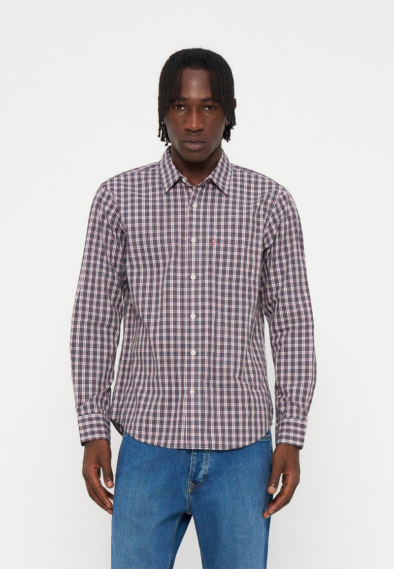Camisa