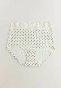 Culotte taille haute crème avec motif de palmiers noirs et large ceinture en dentelle blanche, posée à plat sur un fond clair.