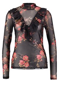 Top lungo a maniche nere trasparenti con motivo floreale in tonalità di rosa e verde, caratterizzato da un colletto arricciato e una sottile texture.