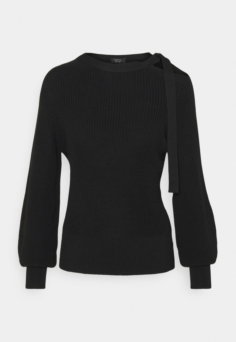 Pull noir en maille à manches longues avec manches ballon et un détail de ruban noué sur l'épaule gauche.