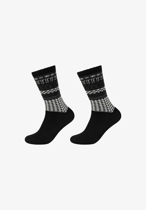 Sorte sokker med et mønstret gråt og hvidt ankeldel. Har et strikket design med geometriske former og en glat overflade.