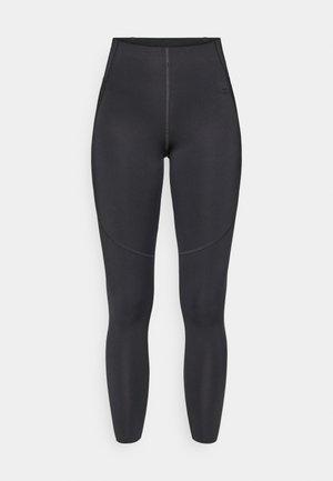 Fekete, magas derekú leggings rugalmas anyagból, lapos varratokkal és testhezálló kialakítással, ideális sportviselethez.