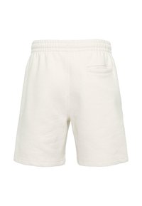 Valkoiset puuvillashortsit, joissa on joustava vyötärönauha, takatasku ja sileä pinta. Pituus reiden puoliväliin ja rento istuvuus.