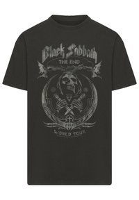 Black cotton T-shirt featuring a gray skull graphic with bats, text "Black Sabbath The End," and circular design elements. World Tour detail included.