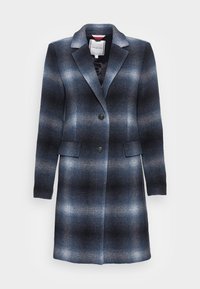 Lang vrouwenjas met een blauw-grijs gradient ruitpatroon, twee knopen, een gesneden reverskraag en klepzakken.