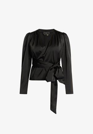 Crop top in satin nero con maniche lunghe, scollatura a V, spalle gather e un fiocco in vita per una vestibilità regolabile. Texture liscia e design elegante.