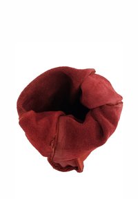 Red suede bucket bag with a soft, textured finish, featuring a wide opening at the top and an unstructured shape.