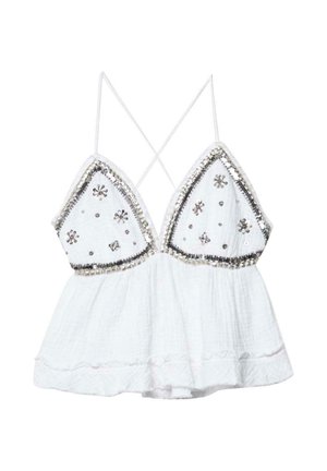 Biały bezrękawnik z cienkimi ramiączkami, ozdobiony srebrnymi cekinami i małymi gwiazdkowymi ozdobami w okolicy biustu.