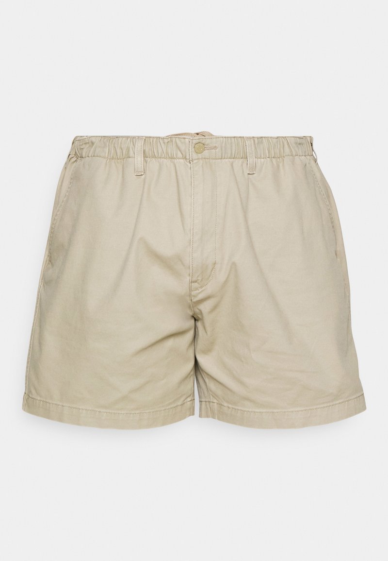 Beige Baumwollshorts mit elastischem Bund, Knopfverschluss, Seitentaschen und umgenähten Kanten. Einfaches, funktionales Design.