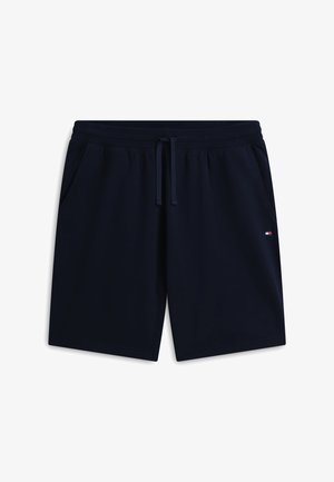 Navy blue casual shorts with elastic waistband, drawstring, side pockets, and small red, white, and blue logo on right leg.