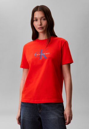 Calvin Klein Jeans HERO CLASSIC MONOLOGO - T-shirt imprimé - orange