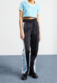 adidas Originals Träningsbyxor - black