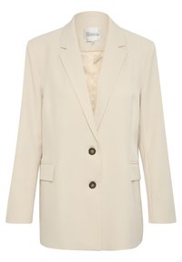 Blazer beige en un tejido texturizado con solapa de muesca, dos bolsillos frontales y cierre de dos botones. Corte ajustado y mangas largas.