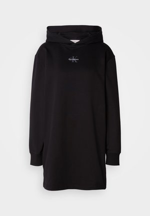 Black hooded sweatshirt with long sleeves, made of soft fabric. Features a small white logo on the chest. Classic pullover design.