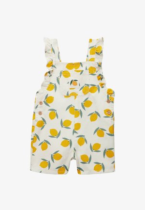 Barboteuse blanche pour tout-petit avec motif citron jaune et feuille verte, bretelles à volants, poche avant et boutons latéraux en bois.