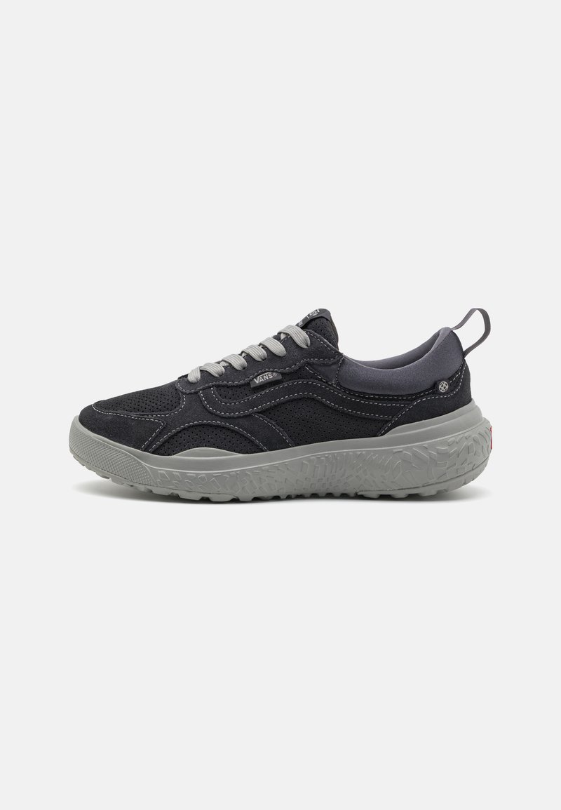 Black and grey sneaker featuring a mesh upper, padded collar, textured rubber sole, and contrasting stitching details.