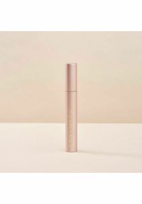 Roséguldfärgad mascararör med en elegant cylindrisk form och en glansig yta. Har varumärket "LENOITES" i en kontrasterande font.