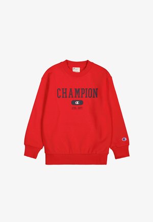 Sudadera roja con la frase "CHAMPION ATHL. DEPT." en azul marino, puños y dobladillo de canalé, con parche de logo en la manga. Material de algodón suave.