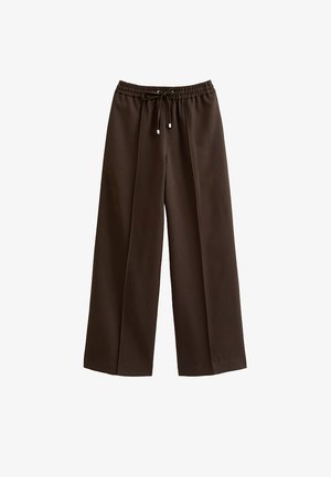 Bruine wijde broek gemaakt van gladde stof met een elastische tailleband en verstelbaar trekkoord, met een losse pasvorm en zonder zichtbare zakken.