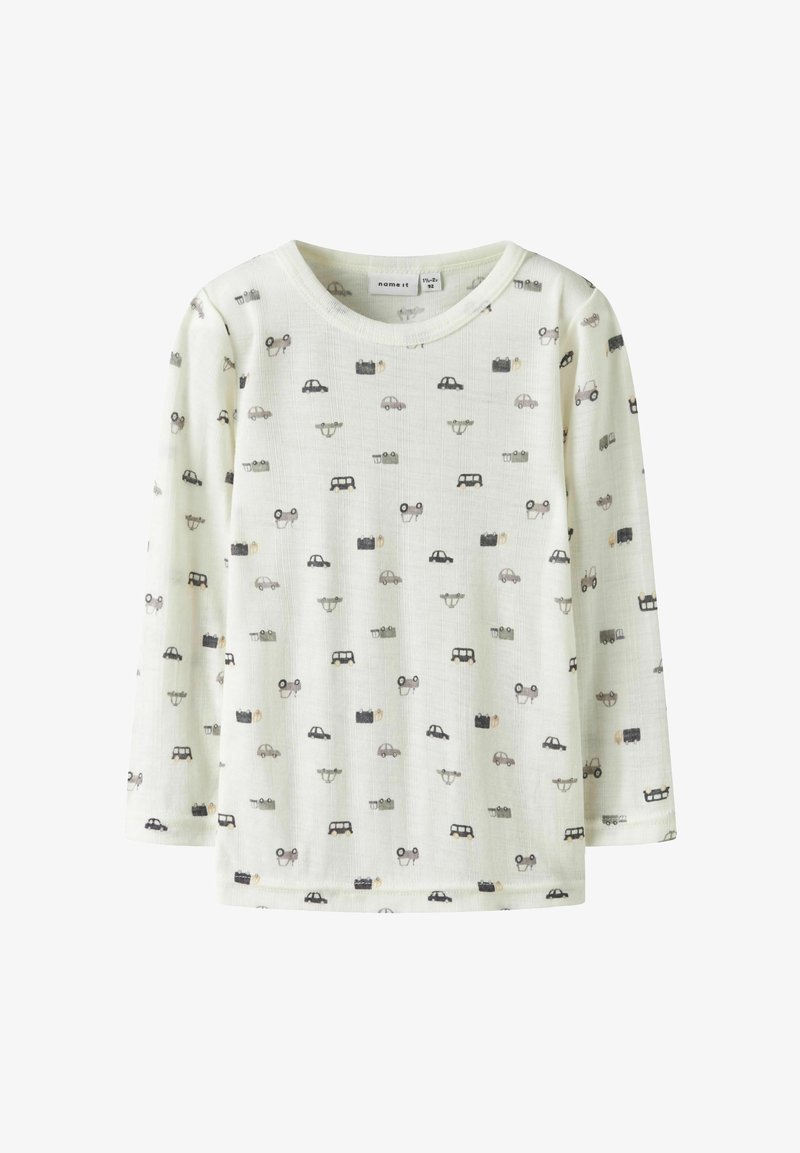 Heled roheline pika varrukaga särk, millel on kõikjal prinditud erinevad autod ja kaamerad. Särk on valmistatud pehmest, tekstuuriga kangast ja sellel on ümar kaelus.