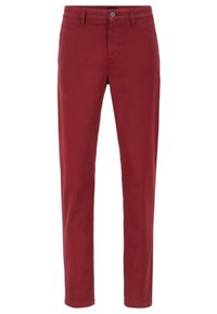 Czerwone bawełniane spodnie o prostym kroju, z zapięciem na guziki i szlufkami na pasek, gładką teksturą i bez widocznych wzorów.