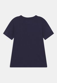 Plain navy blue short-sleeve crewneck t-shirt laid flat, showing back side on white background.