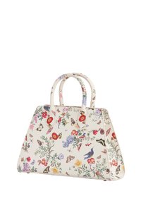 White handbag featuring a floral and butterfly print with vibrant colors. It has a structured shape and dual handles for carrying.