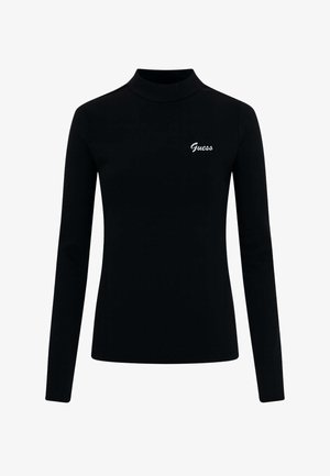 Top nero a maniche lunghe realizzato in tessuto elasticizzato, con collo alto e logo "Guess" bianco ricamato sul petto.