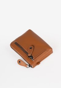 Brown leather wallet with a square shape, featuring a zippered pocket and a small loop for attachment. Smooth texture and black hardware accents.