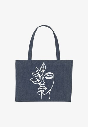 Borsa a spalla blu scuro con due manici, decorata con un disegno a linea continua bianco del volto di una donna intrecciato con rami fogliosi.