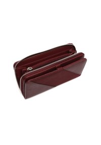 Burgundy leather wallet with a zip closure, featuring multiple compartments and a textured finish, showcasing a sleek, angular design.