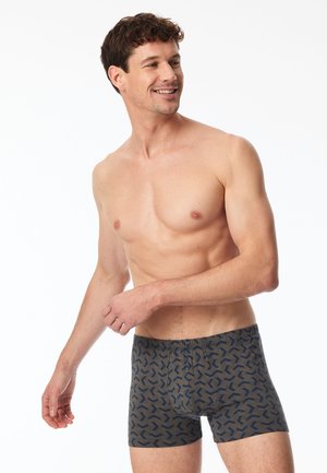Men's boxer shorts in dark gray fabric with a geometric pattern in navy. Features a snug fit and elastic waistband.