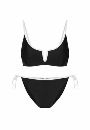 Black bikini featuring a triangular top with a white trim and adjustable straps, paired with a low-rise bottom with side ties and white accents.
