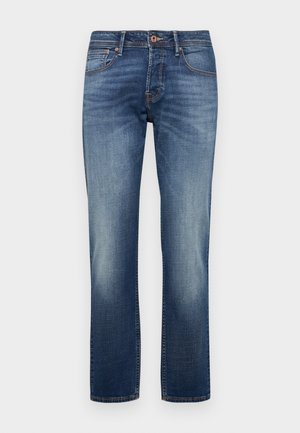 Jeans denimowe w średnim niebieskim odcieniu, z prostym krojem nogawki. Średni stan, z delikatnym wyblaknięciem i kontrastowym przeszyciem. Projekt pięciu kieszeni.