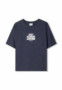 Navy blue cotton t-shirt with short sleeves, crew neckline, and white graphic text that reads "JUST HANGIN' AROUND PEANUTS."