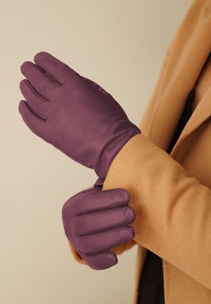 Purple insulated gloves with a smooth texture, featuring horizontal seams on fingers and a snug fit around the wrist.