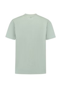 Lichtgroene t-shirt met korte mouwen, een ronde hals en een gestructureerde stof. Heeft een subtiele logo op de achterzijde van de halslijn. Eenvoudig en modern ontwerp.