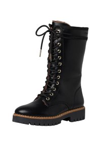 Black leather lace-up boot with gold eyelets, brown fur lining, and a thick black rubber sole featuring a textured grip tread.