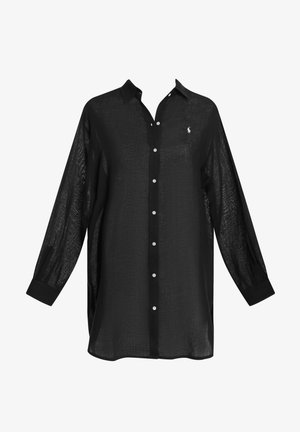 Chemise noire à manches longues en tissu transparent avec un devant à boutons, dotée d'un col pointu et d'un petit logo brodé sur la poitrine.